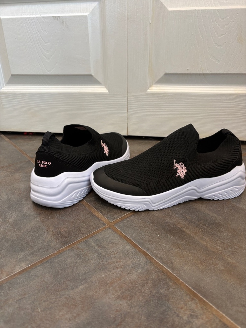 U.S. Polo Assn. Women’s Black Slip-On Knit Sneakers with Pink Logo